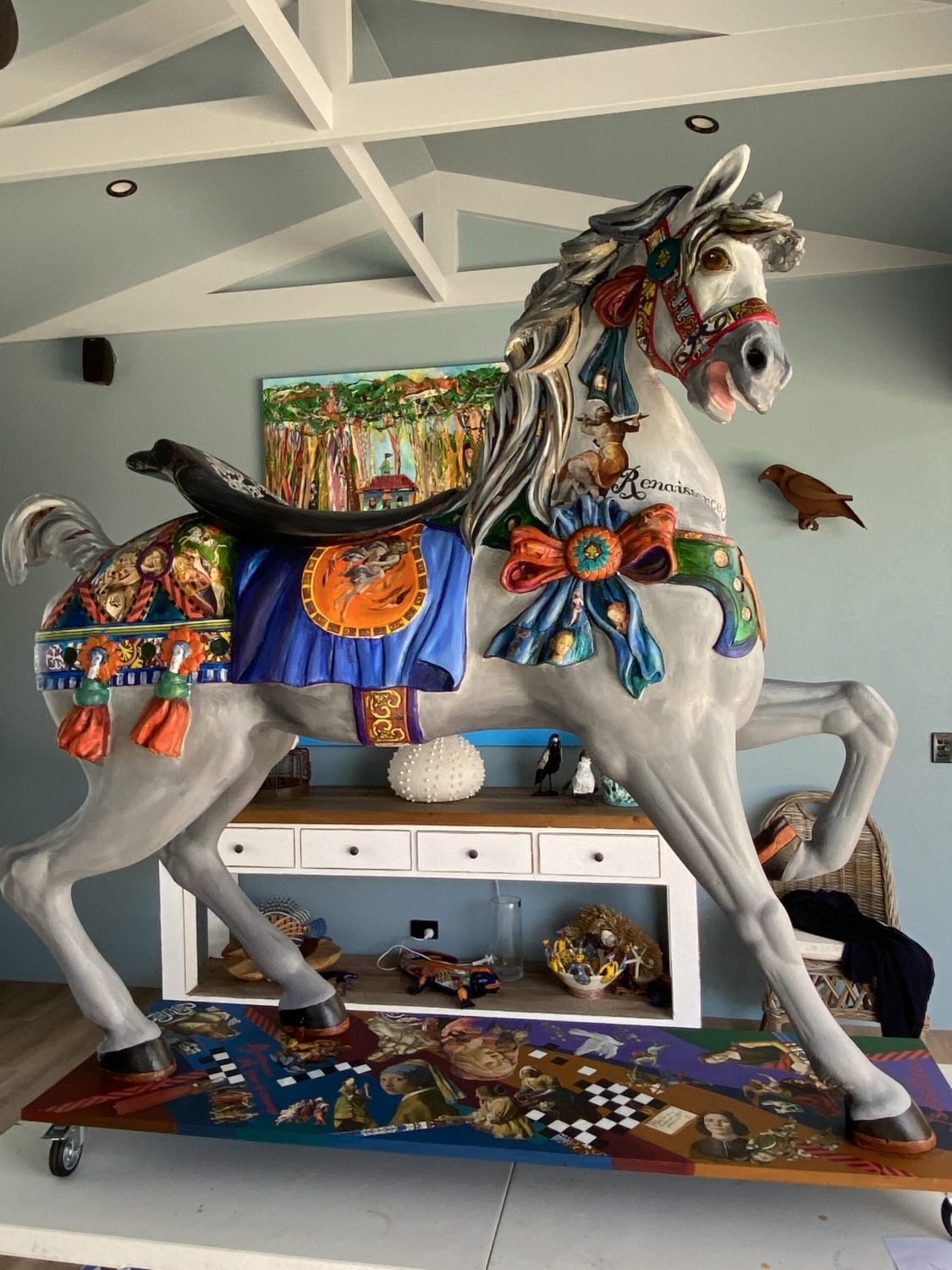 Isabelline - Carousel Horse. This horse standing 1600 cm high was originally a Christmas horse in a David Jones window display. - green and gold. After cleaning it , it was repainted grey, I added a new base and then decoupaged it in Renaissance  style. It was finished with 3 coats of lacquer.