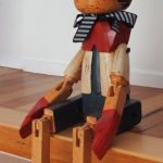 Pinocchio - wooden figure - 70 cm sitting